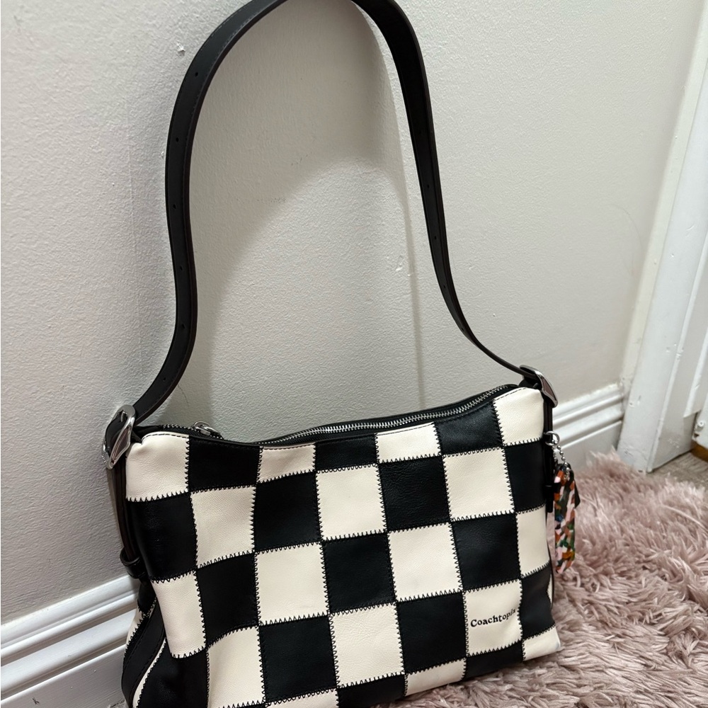 Coach the large Black and Cream Checkered Shoulder Bag with wallet included.